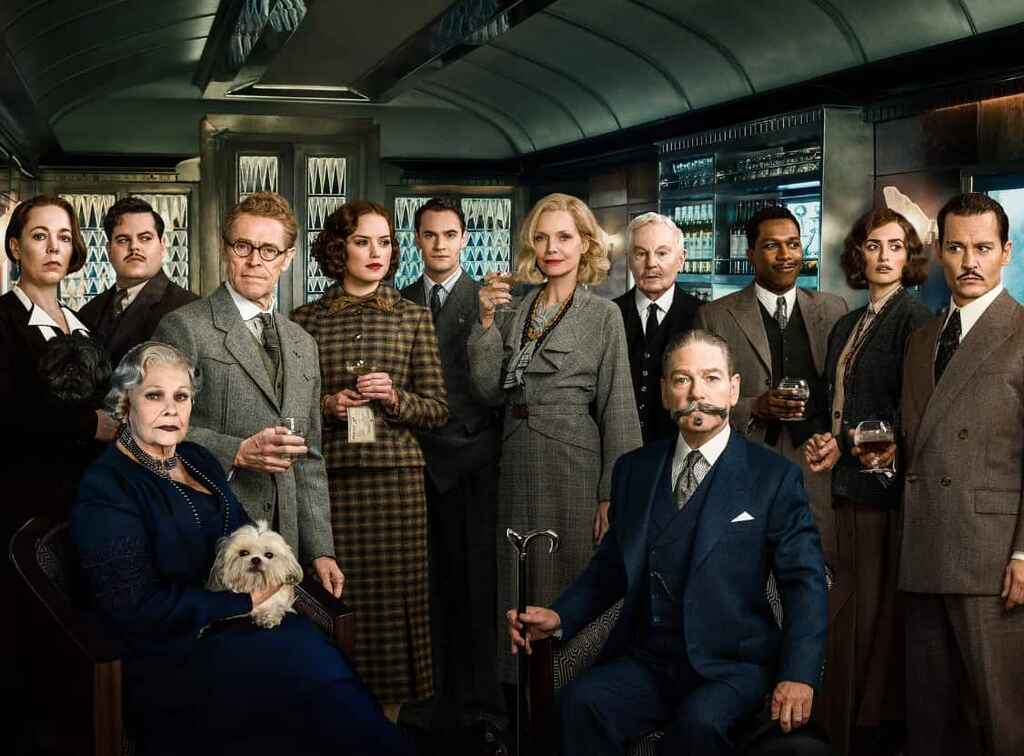 A group of actors standing in a train, still from the movie Murder on The Orient Express