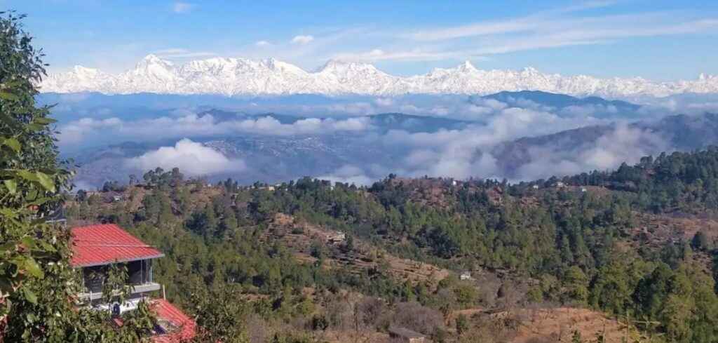 View from the Himalayas Writing Retreat. It's beautiful countryside, with imposing snowy peaks toward the distance.