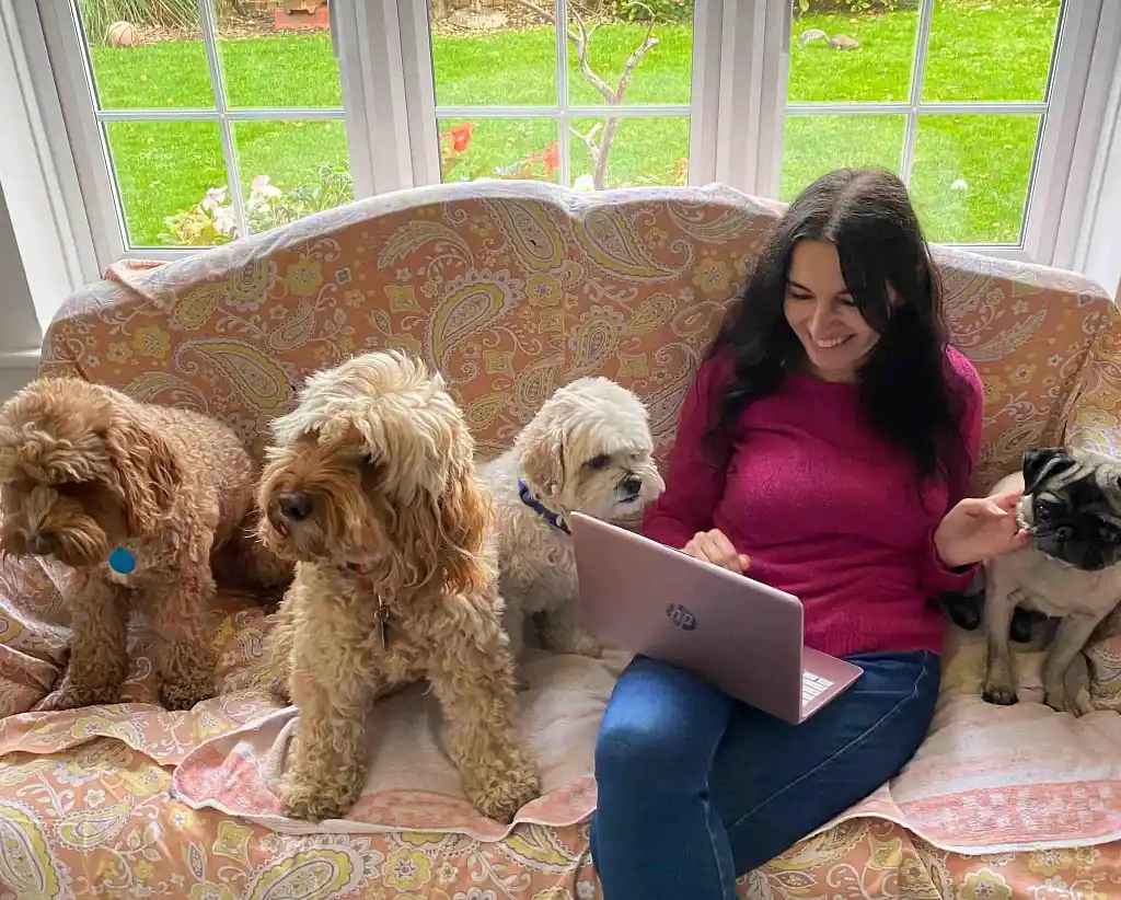 Fiza writing a novel while on puppy duty