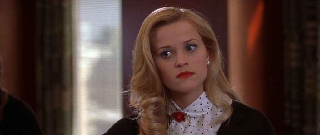conflict | Reese Witherspoon in Legally Blonde, looking stern