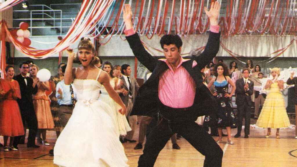 How to become an editor | Image of John Travolta and Olivia Newton John dancing in Grease the movie.
