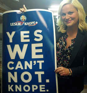 Campaign promo from Leslie Knope's election run -- placard reads" Yes we can't not Knope"
