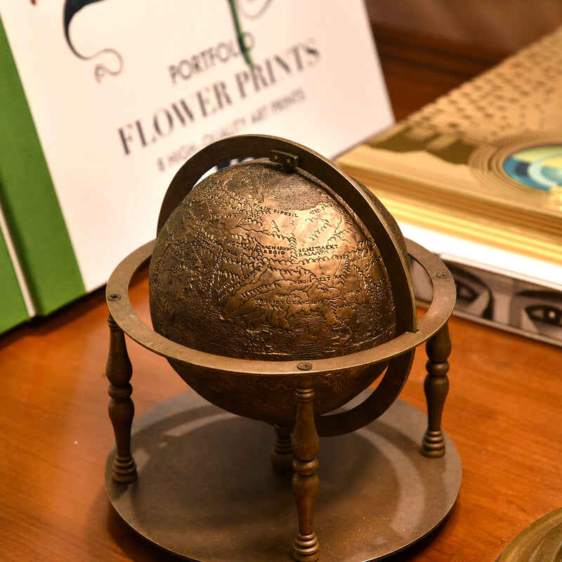 The Hunt-Lenox globe replica set on a desk.