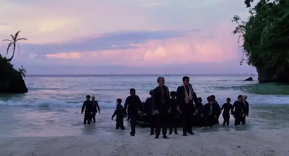 The boys from Lord of the Flies wash up on the beach.