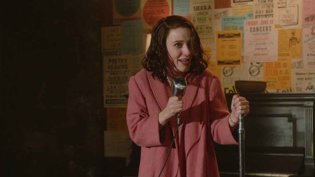 How to Publish a Poetry Book | Still from the series The Marvelous Mrs Maisel, showing the protagonist speaking at an open mic night.