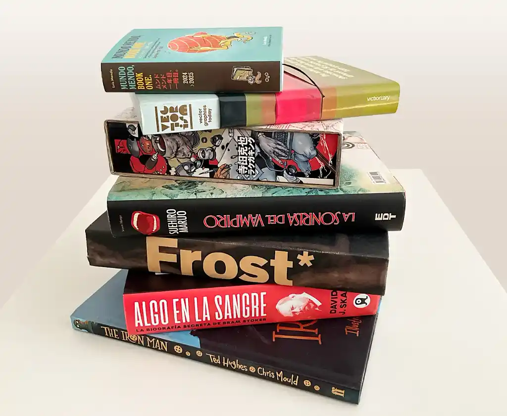 A pile of books with their spines facing outward